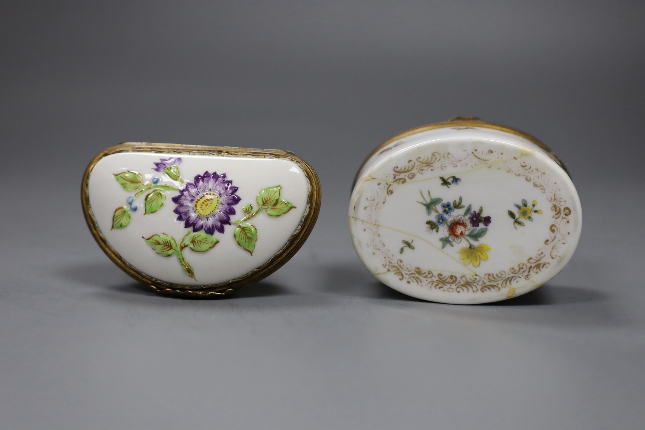 Two Continental porcelain snuff boxes circa 1900, one a novelty Aesop fable design, height 9cms